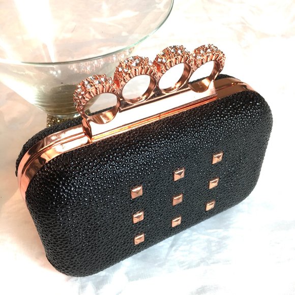 Rihanna Handbags - Rihanna Brass Knuckle clutch rose gold metal trim